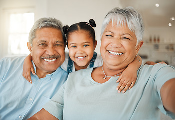 Image showing Selfie, love and grandparents with a girl, home and happiness with joy, loving and relax. Portrait, old man or elderly woman with female grandchild, smile or family with retirement, break or vacation