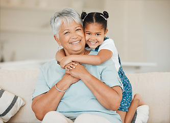 Image showing Family, grandmother and grandchild hug with smile in portrait, happiness and bonding at home. Love, care and trust with elderly woman and young child in living room, embrace and happy at house