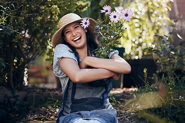 Image showing Florist woman, garden and flowers in nursery, smile and hug plant with excited face for sustainable small business. Girl, entrepreneur and love for plants, growth and nature with happiness in spring