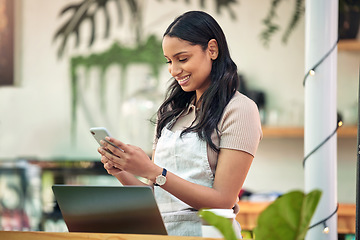 Image showing Happy, communication and a woman with a phone at a nursery for orders, business app or email. Smile, contact and a young florist with a mobile for social media, work management and connection