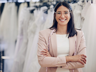 Image showing Arms crossed, fashion and designer with portrait of woman in bridal store for wedding dress, creative and boutique. Small business, retail and tailor with female employee for clothes and workshop