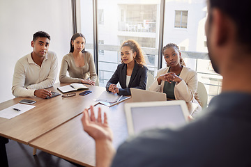 Image showing Meeting, coaching and a business man with a tablet in the boardroom, talking to his team of colleagues. Workshop, presentation and teaching with a male manager in the office during a training seminar