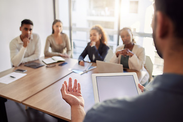 Image showing Meeting, presentation and a business man with a tablet in the boardroom, talking to his team of colleagues. Workshop, coaching and teaching with a male manager in the office during a training seminar