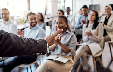 Image showing Speaker, business training or talking with hand in presentation, seminar or speaking to professional conference meeting. People, audience or group of workers at corporate tradeshow or workshop