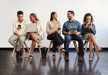 Image showing Technology, hiring and recruitment with business people sitting in line waiting for a human resources meeting. Interview, online and talking with a happy candidate group in a row for a job vacancy