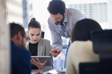 Image showing Digital tablet, discussion and business people doing research together in a meeting in the office. Technology, professional and corporate team working on a project in collaboration in the boardroom.