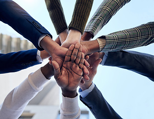 Image showing Group, hands and together in circle for celebration, collaboration or people in business, company and teamwork. Businesspeople, below and celebrate success, deal or outdoor workplace team building