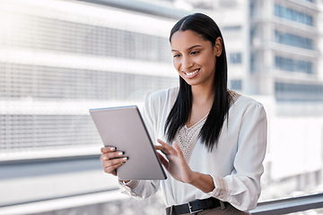 Image showing Business woman, tablet and outdoor with a smile for communication, networking and research. African female entrepreneur in a city with tech or network connection for social media app or reading email