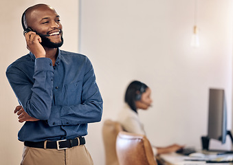 Image showing Call center, laughing and man with headset for customer service, crm or telemarketing support. Black person, consultant or agent talking on microphone for sales, contact us or help desk space