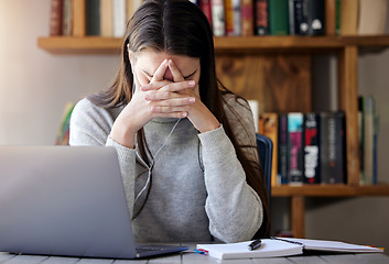 Image showing Laptop, stress and education with a student woman feeling burnout while studying alone in her home. Learning, headache and tired with a young female university or college pupil in her house to study