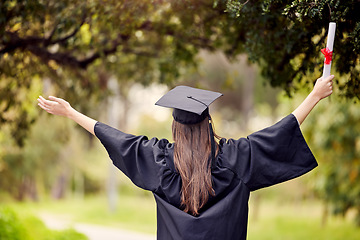 Image showing Graduate, woman celebrate and open arms with degree and diploma at event outdoor with scholarship. Certificate, back and hand holding college paper with cheer, success and motivation with achievement