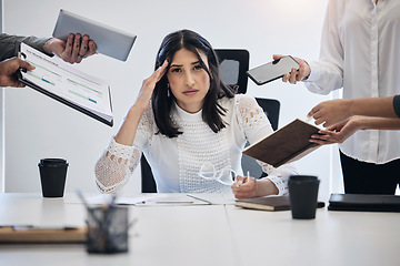 Image showing Portrait, multitask and an overworked business woman at work on a laptop in her office for a deadline. Technology, burnout or stress with a young female employee feeling pressure from a busy schedule