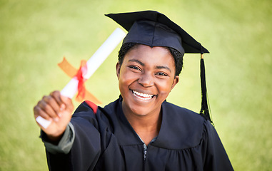 Image showing Portrait, graduation or degree with a student black woman on university campus at a scholarship event. Education, smile or diploma with a happy female pupil standing outdoor as a college graduate