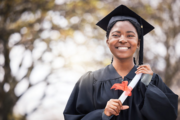 Image showing Portrait, smile or certificate with a graduate black woman on university campus at a scholarship event. Education, graduation or degree with a happy female pupil standing outdoor as a college student