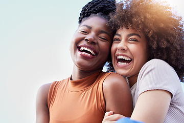 Image showing Couple of friends, black women and hug outdoor while laughing with freedom, happiness and lgbtq love. Face of happy, lesbian and african people together for space in sky or funny adventure in London