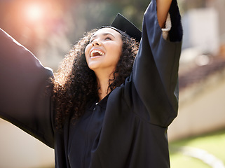 Image showing Graduation, success and woman celebrate achievement of degree, diploma or certificate from university or college. Event, education and young person or graduate on campus excited for a scholarship