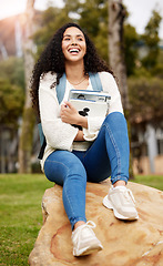 Image showing Park, university and woman with book on campus for learning, knowledge and studying on rock. Education, school and happy female student laugh with textbook for information, research or college lesson