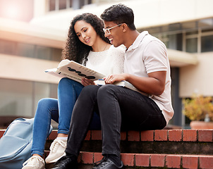 Image showing Reading, university and man and woman with book on campus for learning, knowledge and studying. Education, friends and male and female students with textbook for information, research or college