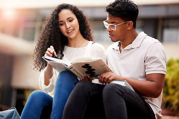 Image showing Reading, university and man and woman study with book on campus for learning, knowledge and studying. Education, friends and male and female students with textbook for information, project or college