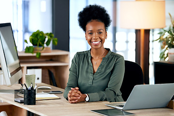 Image showing Portrait of happy black woman at desk with computer, smile and African entrepreneur with pride and tech. Confident businesswoman in office, small business startup and ceo at online management agency.