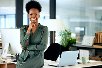 Image showing Portrait of confident black woman in modern office with smile, computer and African entrepreneur with pride. Happy face of businesswoman at small business startup and female boss at management agency