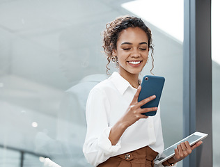 Image showing Professional, woman and tablet with mobile phone at a company is typing a conversation on the internet. Female person, business and communication with tech for entrepreneurship at the office.