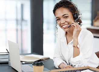Image showing Customer service, portrait of woman with headsets and with laptop at her desk in a office of her workplace. Telemarketing or call center, online communication and female person at her workspace