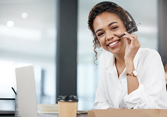 Image showing Consultant, portrait of woman with headset and with laptop at her desk in a office of her workplace. Customer service or call center, online communication and female person for crm or telemarketing