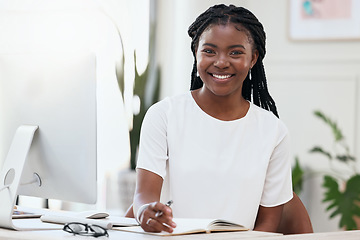 Image showing Portrait of black woman at desk with computer, smile and online research for small business administration. African businesswoman in office with confidence in planning schedule, proposal or report.