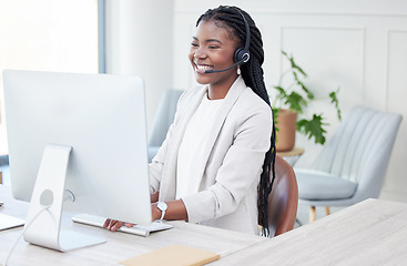 Image showing Customer service, woman with headset and computer at her desk in her modern workplace. Telemarketing or call center, online communication or crm and black female person at her workstation for support