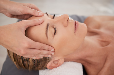 Image showing Spa, treatment and hands with a head massage for facial wellness, luxury therapy and sleep. Skincare, health and a masseuse massaging temple of a woman at a salon for reflexology and acupressure