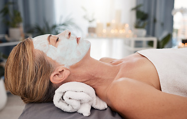 Image showing Woman, customer and mask with facial, spa and relax with skincare, natural beauty and dermatology. Female person, mature lady and client with cosmetics for face, wellness or luxury with peace or rest