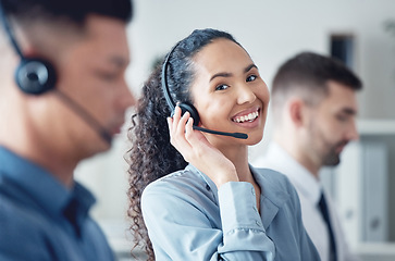 Image showing Woman, callcenter with headset, happy in portrait with CRM, communication with technology and contact us. Customer service, telemarketing or tech support, female consultant with smile and help desk