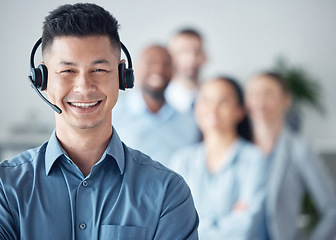 Image showing Man, callcenter and contact us, smile in portrait with leadership and communication, headset and mockup space. Customer service or telemarketing, CRM and help desk, happy male agent and team leader