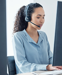 Image showing Woman, callcenter and phone call with CRM and headset, communication, technology and working at computer. Customer service, telemarketing or tech support with female consultant and help desk worker