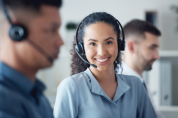 Image showing Woman in portrait, callcenter and headset with CRM, communication with technology and contact us. Customer service, telemarketing or tech support, happy female consultant with smile and help desk