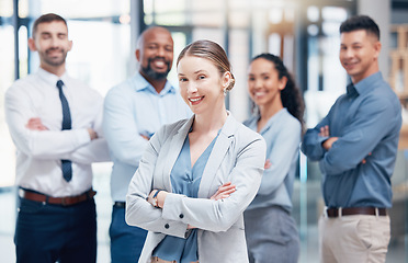 Image showing Smile, business people in portrait with woman leader, confidence and pride at project management company. Teamwork, commitment and vision for happy team with boss and arms crossed in coworking office