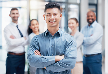 Image showing Smile, business people in portrait with arms crossed and boss at startup with confidence and pride. Teamwork, commitment and vision for happy team with man in leadership in project management office.