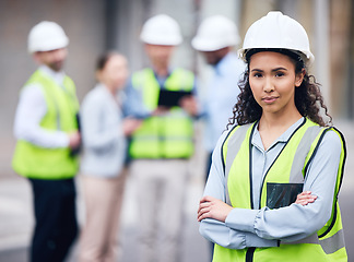 Image showing Business woman, architect and arms crossed in leadership or project management for construction on site. Portrait of female person, engineer or manager in team planning for industrial architecture