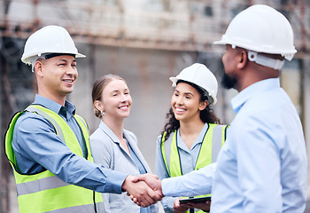 Image showing Business people, architect and handshake in meeting for construction, partnership or teamwork on site. Happy employee workers shaking hands for team building, architecture or b2b agreement in city