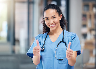 Image showing Happy woman, doctor and portrait with thumbs up for winning, success or good job in healthcare at hospital. Female person or medical professional with thumb emoji, yes sign or like for goal at clinic