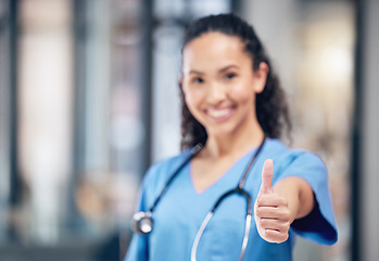 Image showing Woman, doctor and hand in thumbs up for healthcare, winning or success for good job at hospital. Hand of female person or medical professional with thumb emoji, yes sign or like for goals at clinic