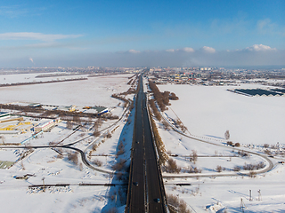 Image showing Aerial view of a road in winter landscape