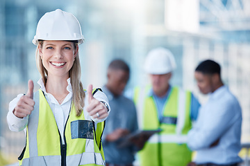 Image showing Portrait, thumbs up and construction with a designer woman outdoor on a building site with her team in the background. Management, motivation and confidence with a female architect standing outside