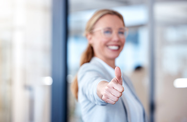 Image showing Business woman, hand and thumbs up for success, winning or thank you and good job at office. Happy female person, CEO or employee showing thumb emoji, yes sign or like for win, goals or motivation