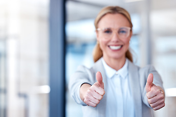 Image showing Business woman, hands and thumbs up for success, winning or thank you and good job at the office. Happy female person, CEO or employee with thumb emoji, yes sign or like for win, goals or motivation