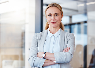 Image showing Business woman, portrait smile and arms crossed in confidence for small business management at the office. Happy and confident female person, manager or CEO in corporate leadership at the workplace