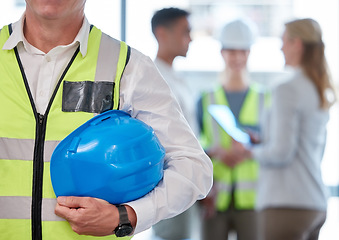 Image showing Helmet, engineering and man or construction worker in office meeting, planning and project management for building. Architecture, hands zoom and safety gear of contractor people, builder and industry