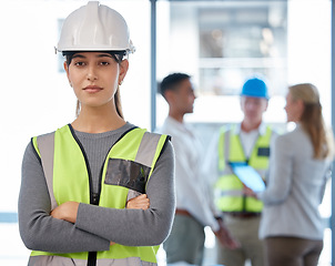 Image showing Architecture, woman portrait and arms crossed for planning, team leadership or project management. Engineering, construction and face of young person, contractor or manager in helmet and job mindset