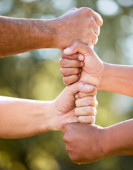 Image showing Fist stack, support and team building outdoor with solidarity, power and nature in summer sunshine. Group, people and hands together for trust, teamwork and motivation in park, garden or backyard